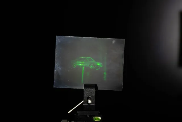 White light hologram of a model car from different viewing angles