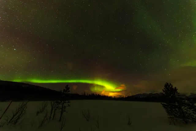 Northern lights in the Lyngenfjord Alps at the seventieth latitude