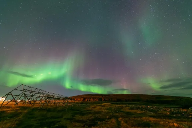 Northern lights over the fish drying racks in Ekkerøy