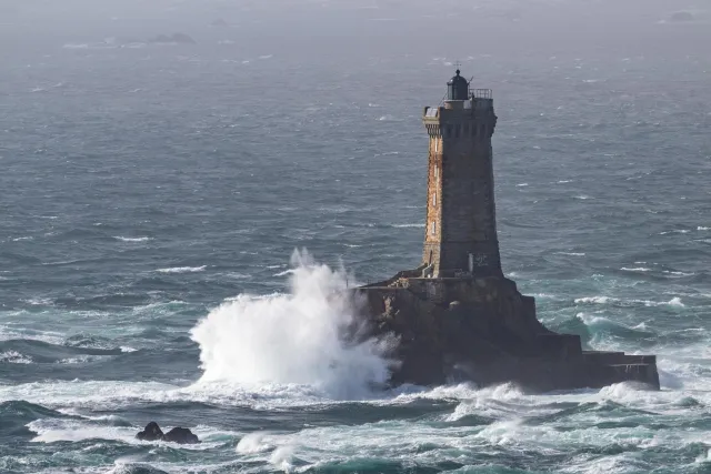 The lighthouse Phare de la Vieille in front of the Pointe du Raz